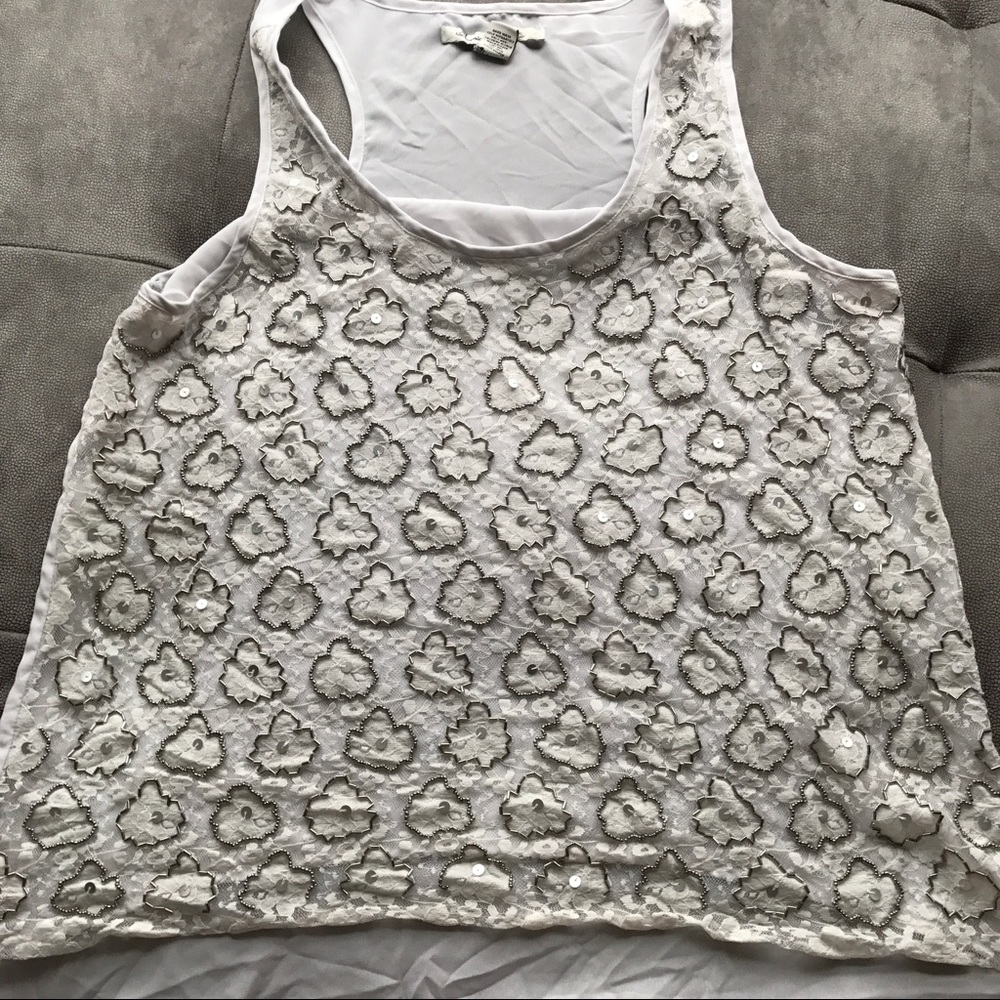 Embellished white tank beaded and sequined